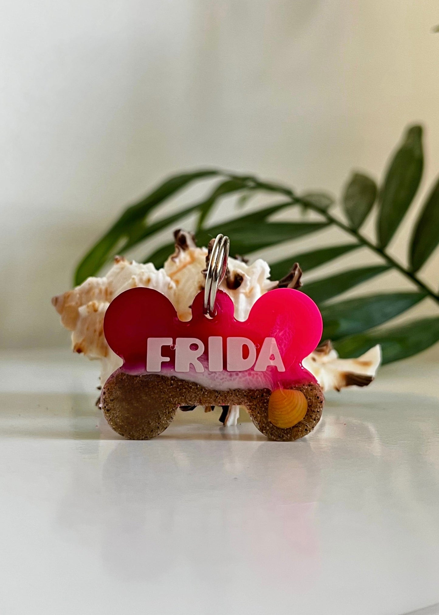 Chapita identificativa 'CORAL PINK'